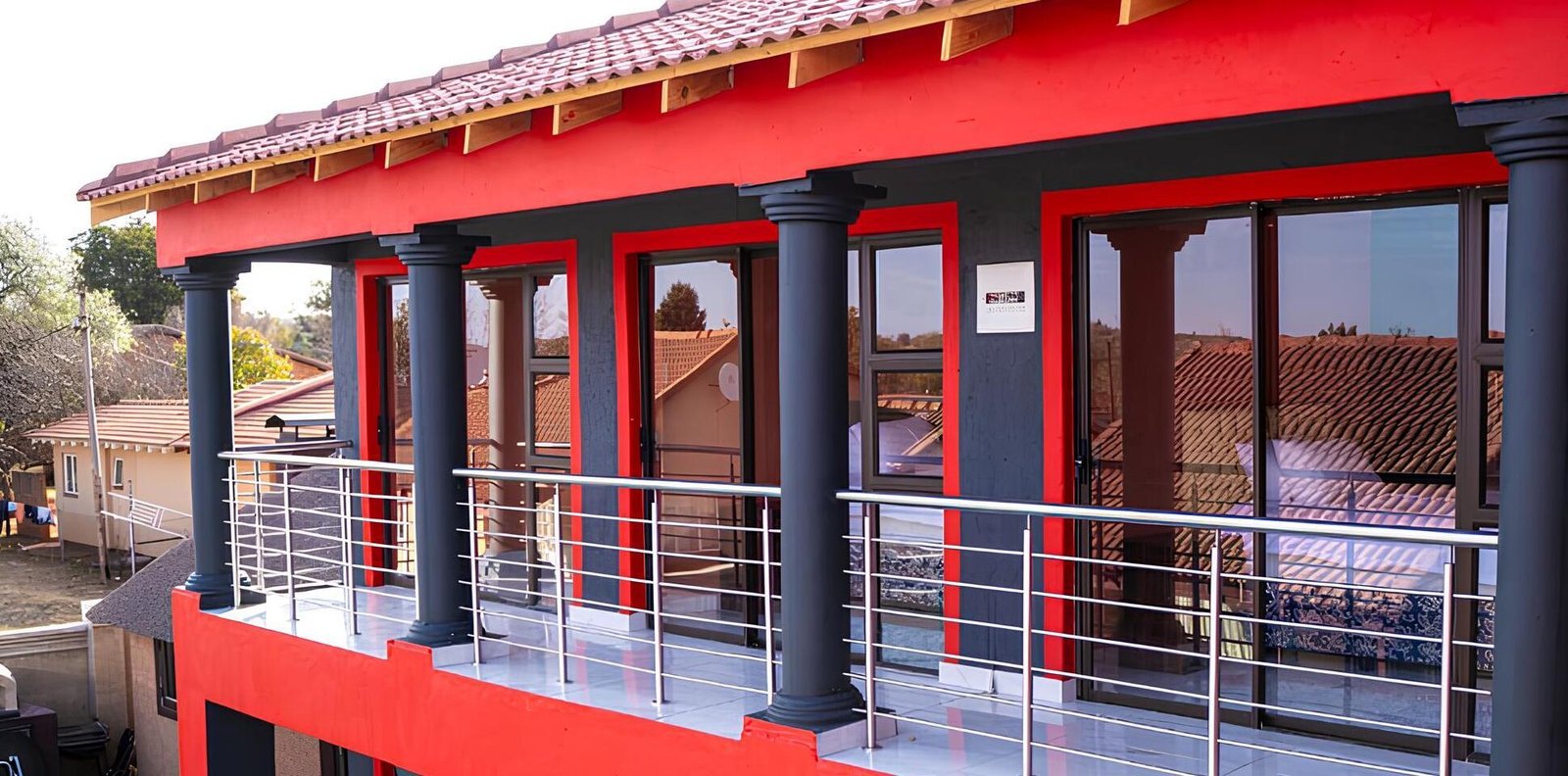 Exterior balcony at Milk and Honey Guest House