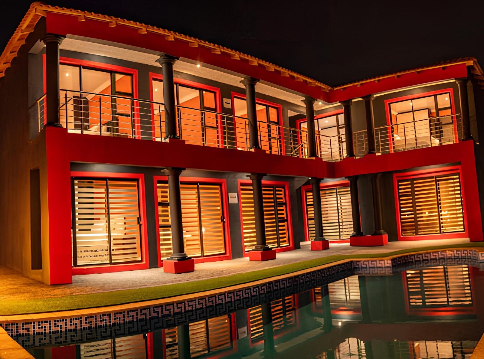 Milk and Honey Guest House exterior at night